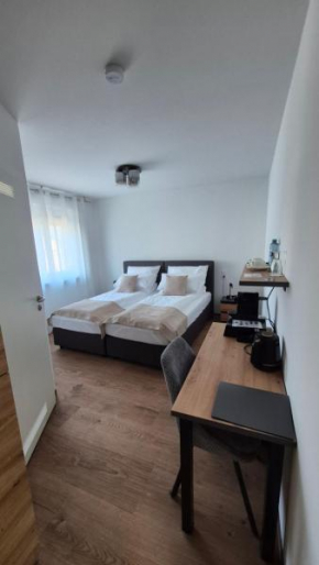 Apartments Seibel Doppel-Zweibettzimmer mit Bad